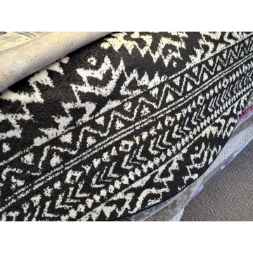 Cobos Geometric Black Area Rug - Round 6ft7in