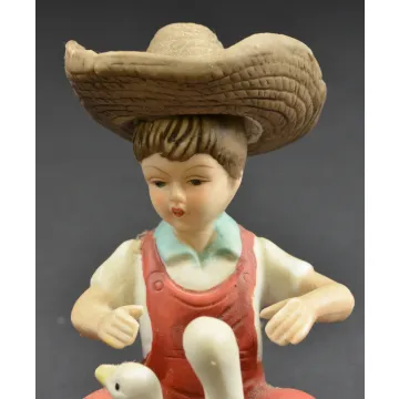 Boy In Straw Hat Playing With The Ducks Ceramic Figurine - 5 Tall