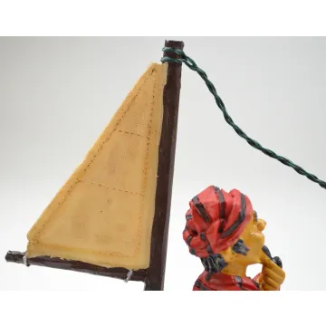Resin Figurine - Fisherman In Sailboat Wearing Red Shirt - 7.375 Tall